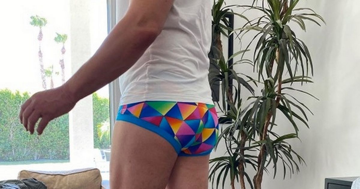 John Barrowman’s cheeky bum flash in tight rainbow pants leaves fans drooling