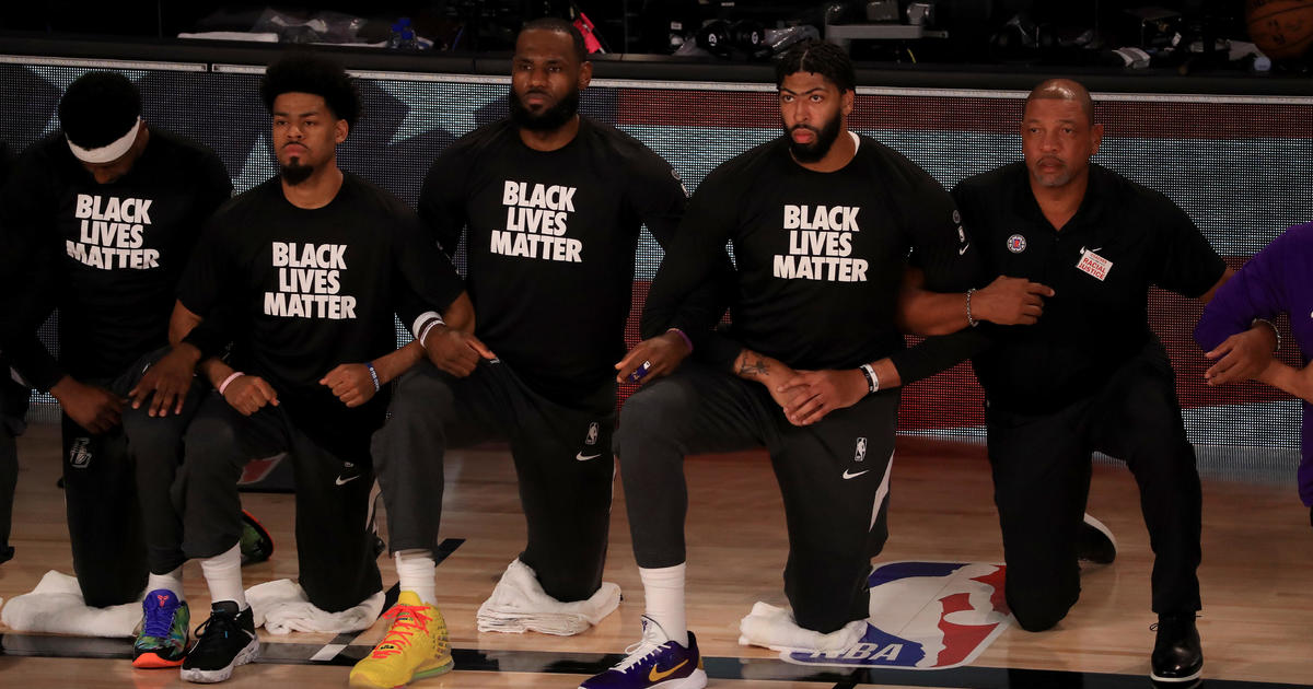 NBA teams kneel during national anthem as season restarts