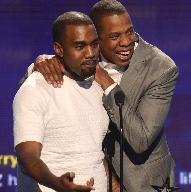 Recording artists Kanye West (L) and Jay-Z