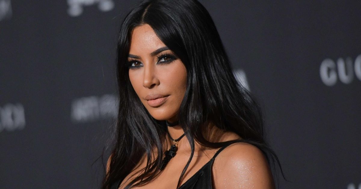 Kim Kardashian leaves Kanye behind to arrive home alone ‘with marriage in doubt’