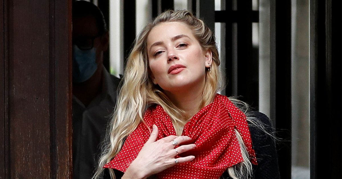 Amber Heard booted sister out of free flat ‘for selling Depp wedding pics’