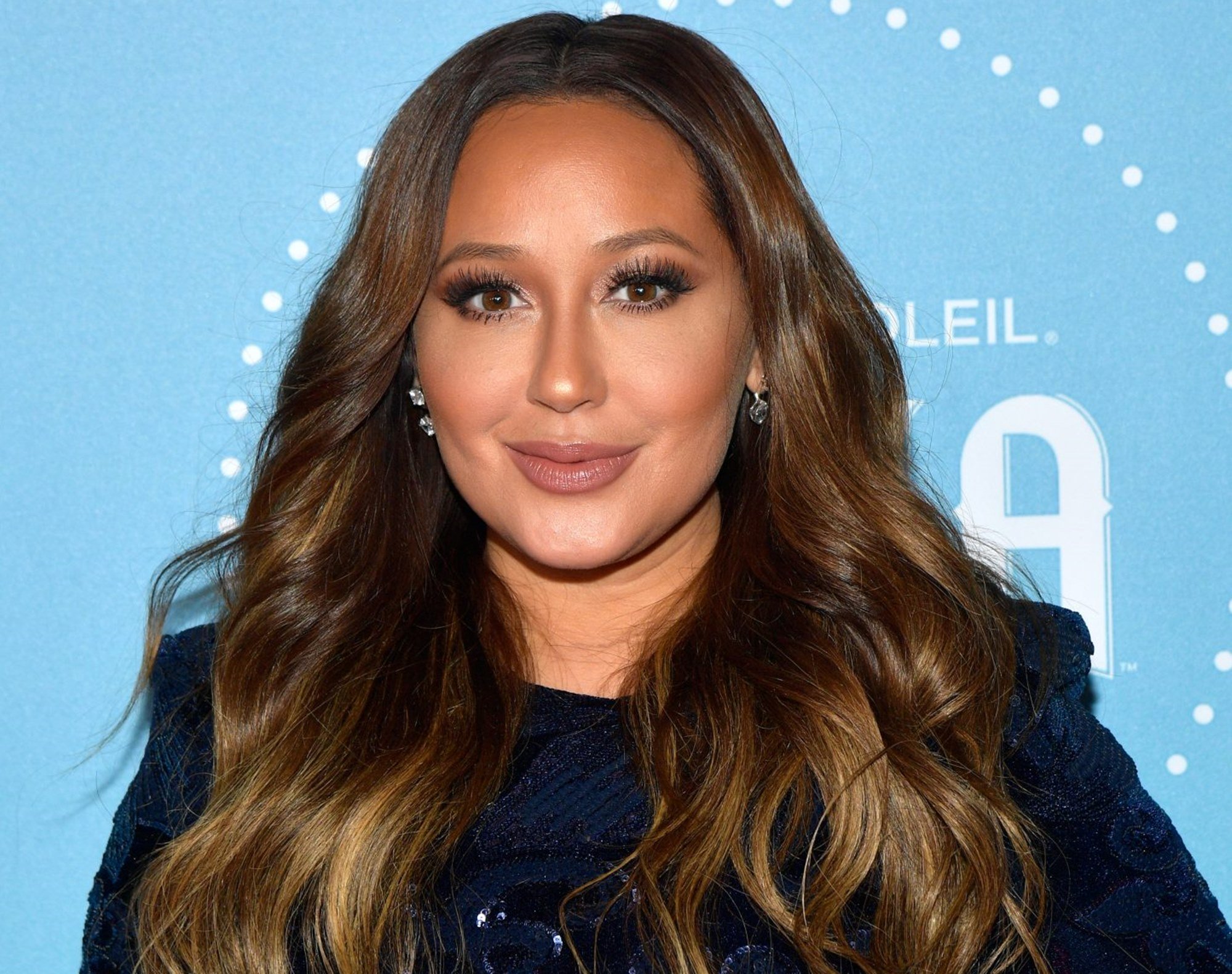 Adrienne Bailon Shares Bathing Suit Photos To Flaunt Dramatic Weight Loss