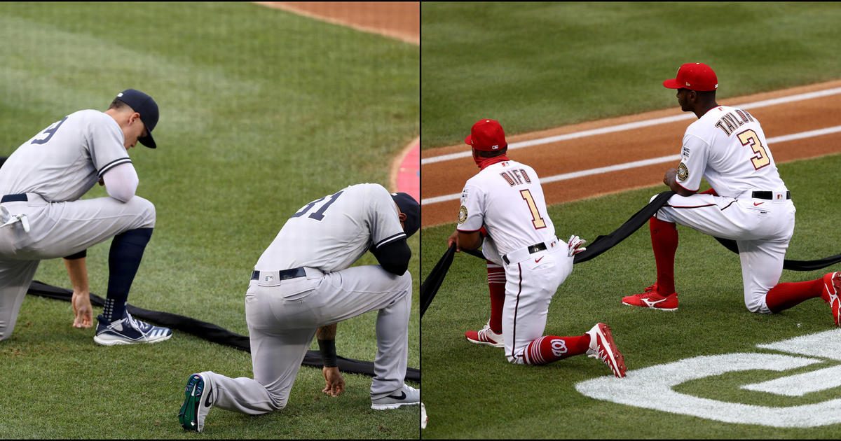 Nationals and Yankees players kneel during moment of silence