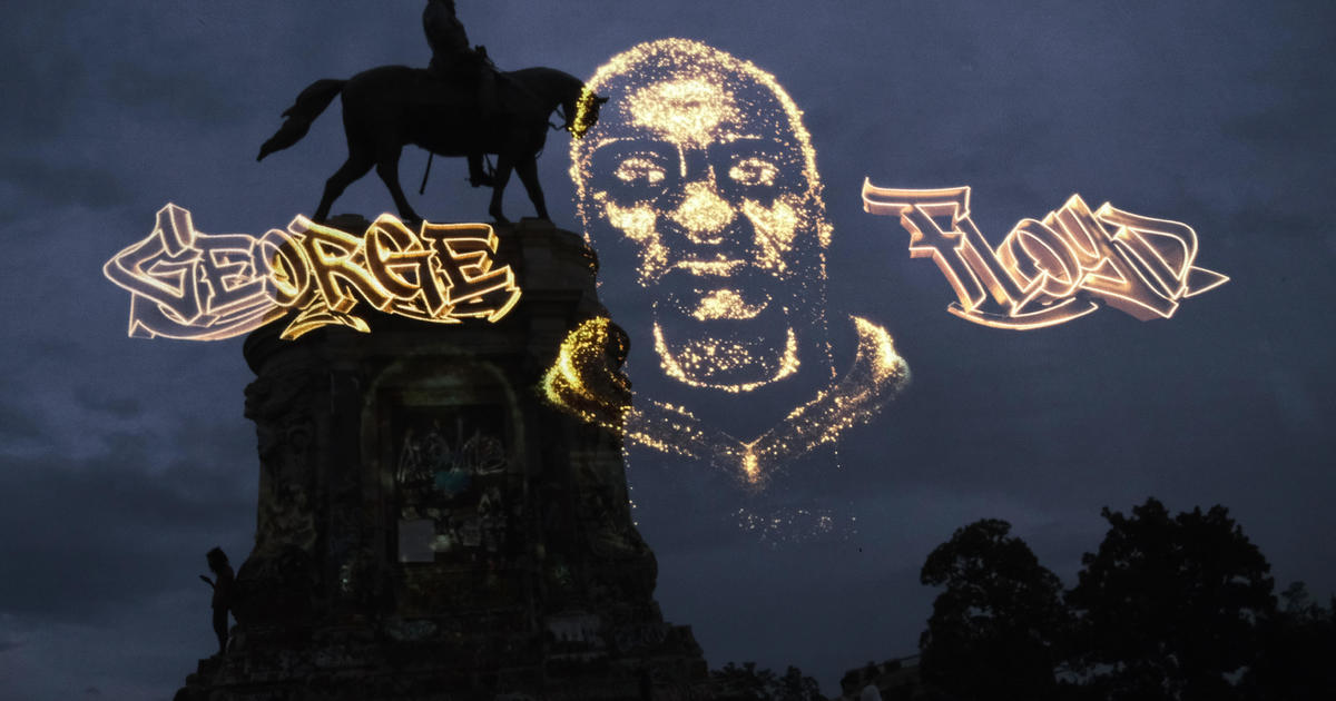 George Floyd hologram lights up over Robert E. Lee statue