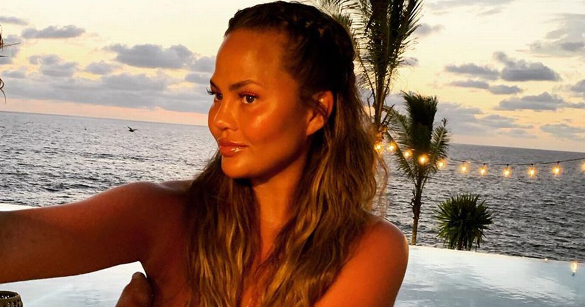 Chrissy Teigen shares breast implant removal surgery pics to prove it was done