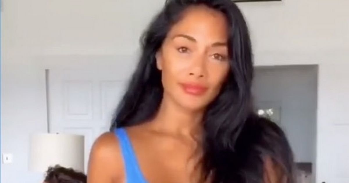 Nicole Scherzinger sizzles in a sky blue bikini as she shows off her dance moves