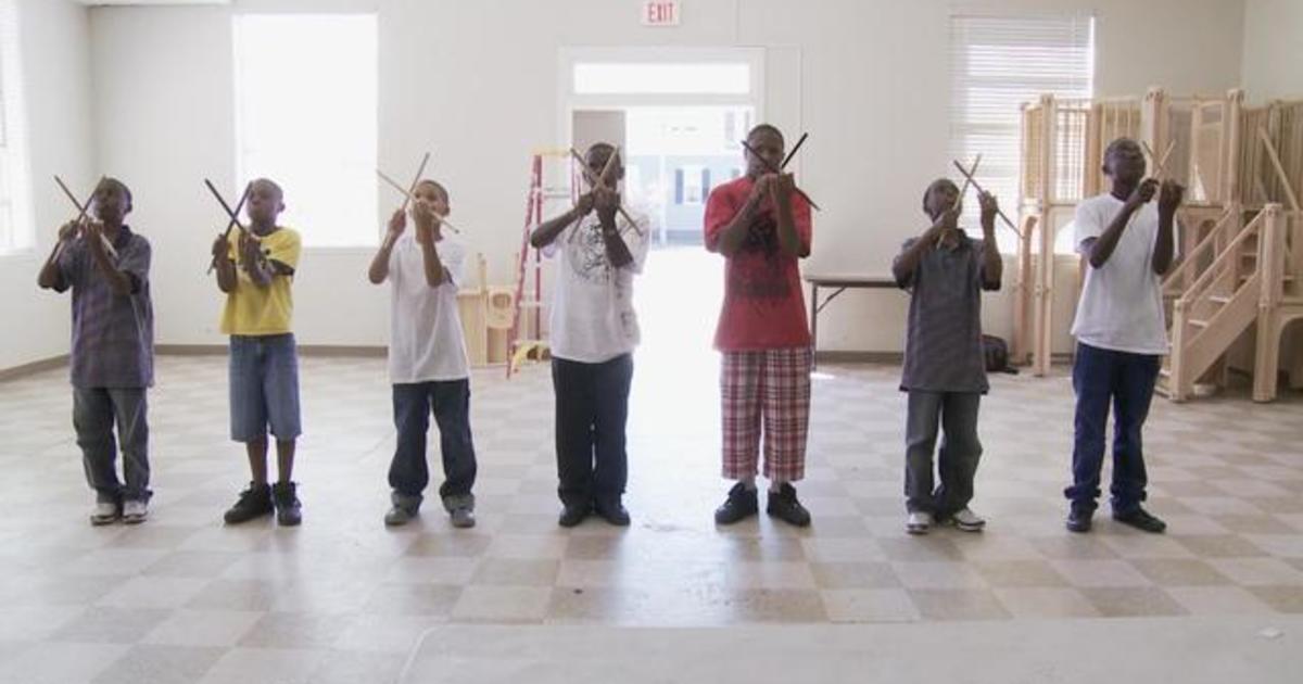 No drums? No problem!  New Orleans kids play on