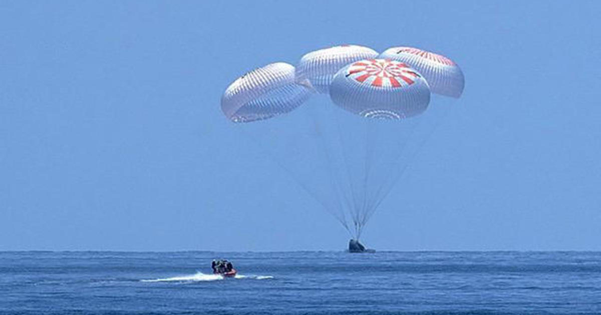 SpaceX capsule brings 2 NASA astronauts back to Earth