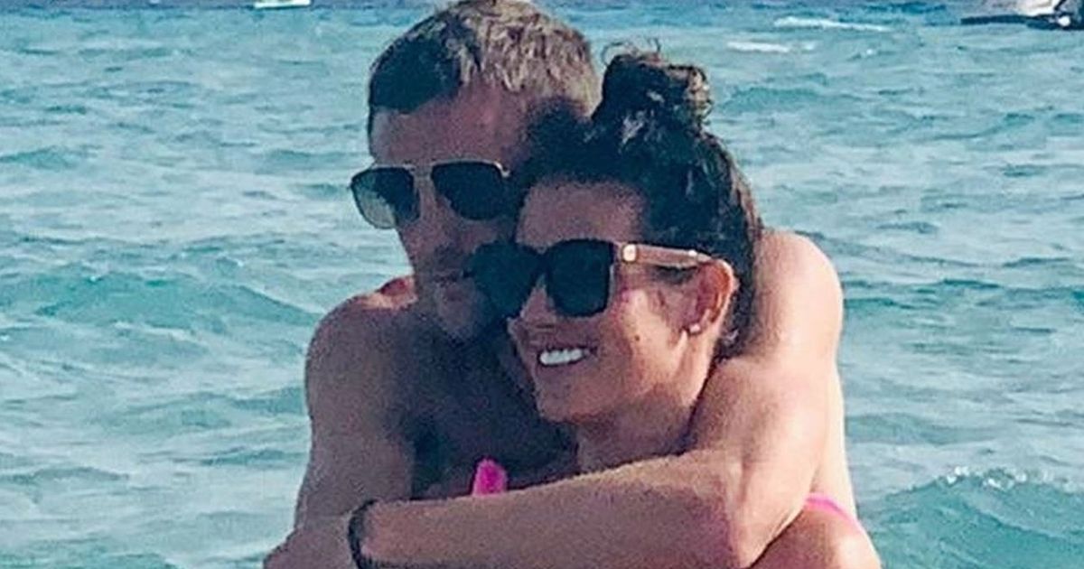 Rebekah Vardy cuddles husband Jamie in Ibiza as Coleen Rooney case looms