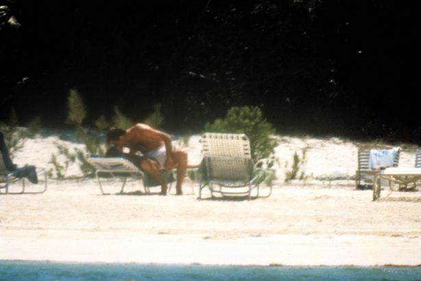 Charles and Diana pictured sharing a kiss on the beach a year after the pictures in question were taken