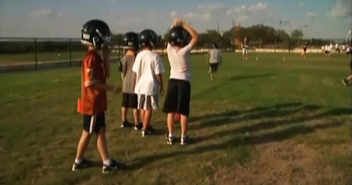 Football helmets’ protective benefits in question