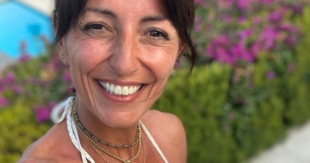 Davina McCall shows off age-defying figure in tiny white bikini