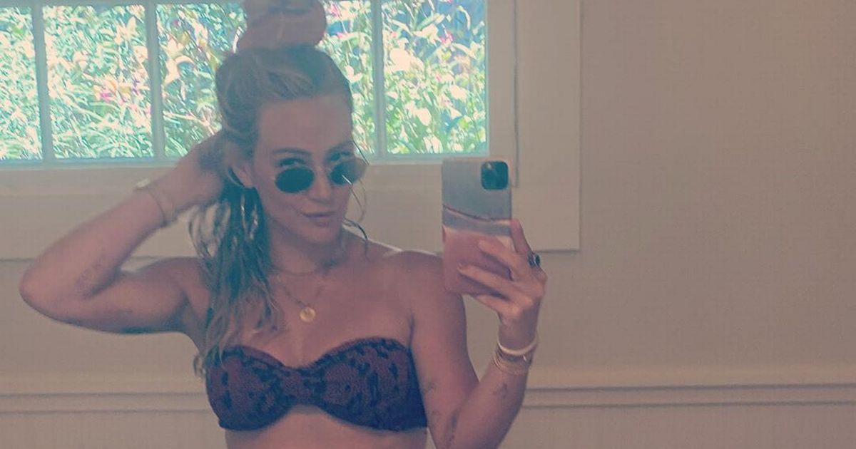 Hilary Duff shows off trim physique in tiny bikini as she praises dieting plan