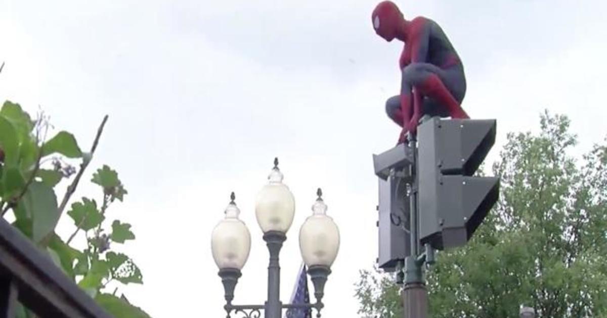 Spider-Man cheers up people in New York town