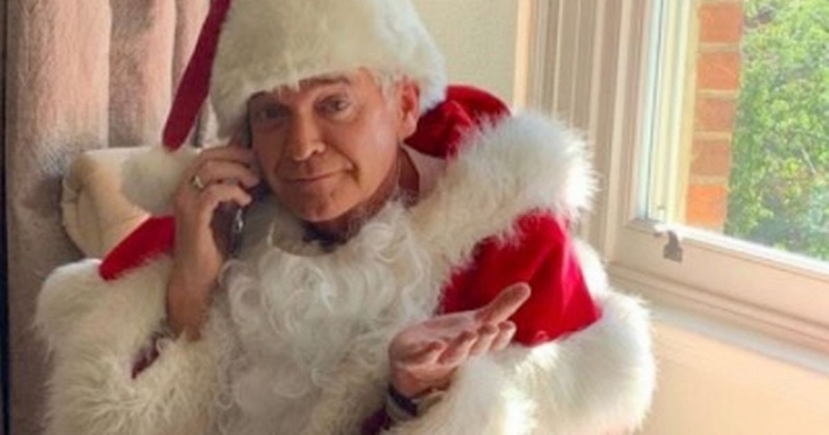 Schofe gives middle finger dressed as Santa in chat with Holly Willoughby