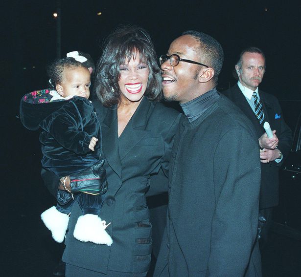 Whitney, Bobby and their daughter Bobbi pictured in happier times