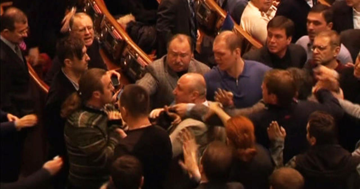 Ukrainian parliamentarians brawl during emergency session