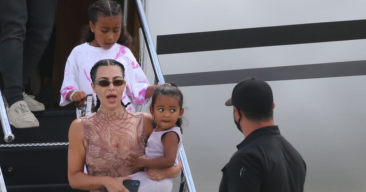 Kim Kardashian and Kanye jet into Miami after holiday ‘which saved marriage’