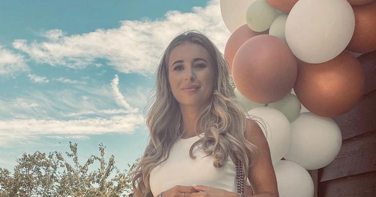 Pregnant Dani Dyer slips into fitted mini dress to flaunt 14-week baby bump