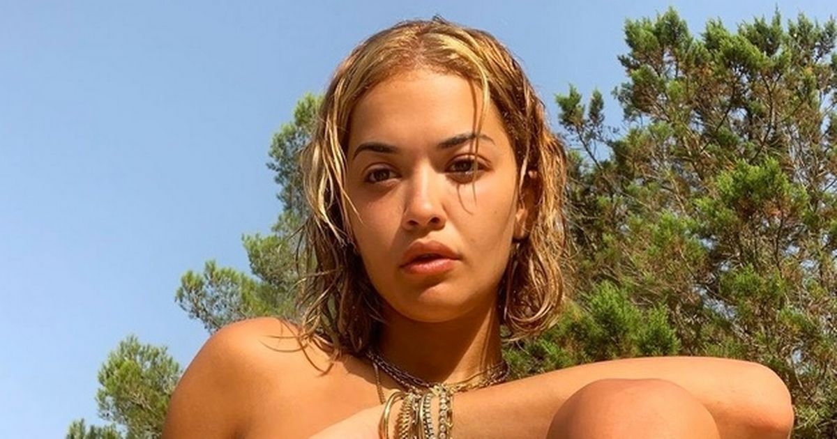 Rita Ora sunbathes completely topless in stunning makeup free snaps