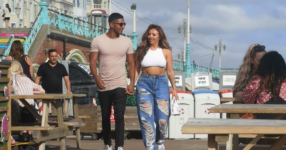 Jesy Nelson holds hands with Sean Sagar on romantic beach stroll in ripped jeans