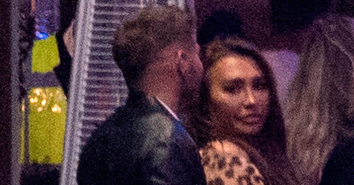 Lauren Goodger cosies up to mystery man on night out before twerking across club