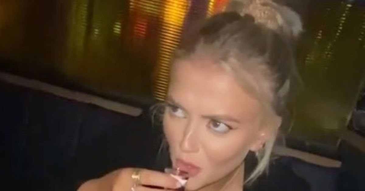 Lucy Fallon lets her hair down as she necks shots on boozy Oxford staycation