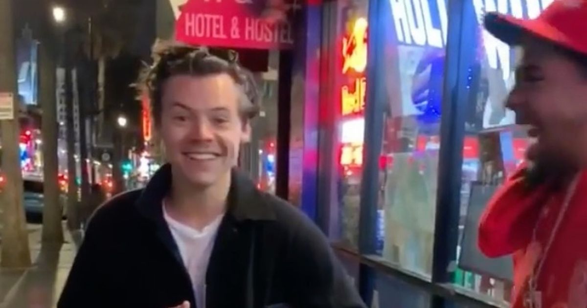 Harry Styles surprised by street performer’s trick in most wholesome video ever