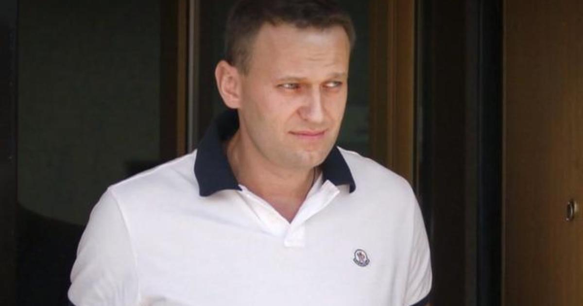 Associates of Putin critic Alexei Navalny say he was poisoned at Siberian hotel