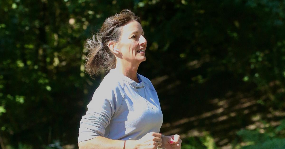 Davina McCall heads for sweaty jog after debuting washboard abs in bikini snaps