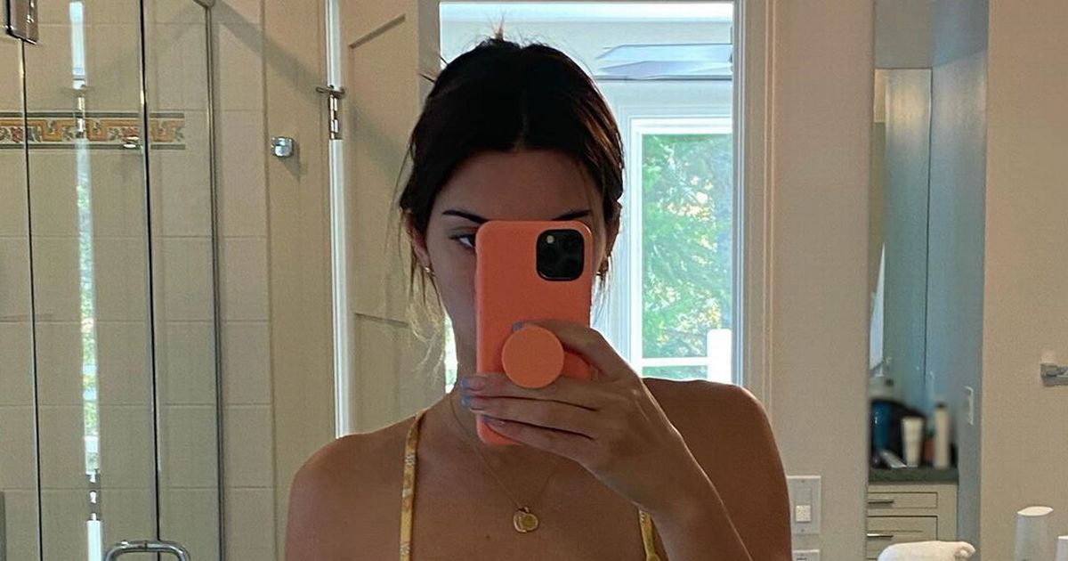 Kendall Jenner flashes model abs in skimpy bikini ‘on holiday with Devin Booker’