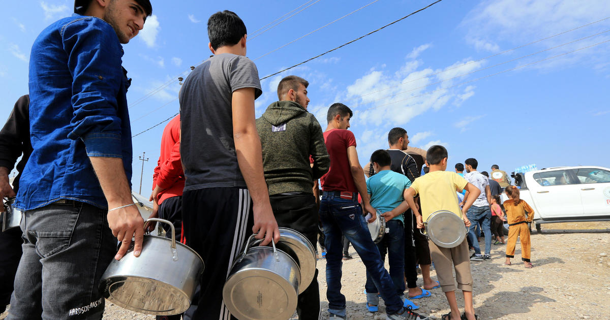 As country crumbles, Syrians face “terrifying” option of refugee life