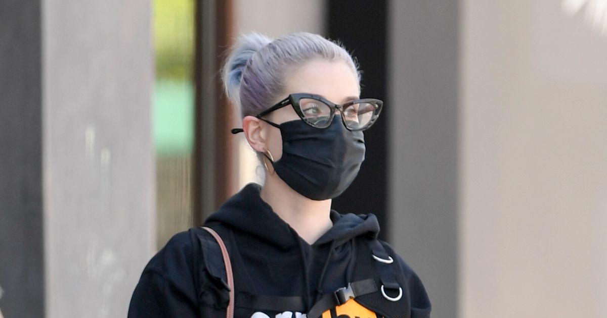 Kelly Osbourne flashes flat tum after 4-stone weight loss in porn site hoodie