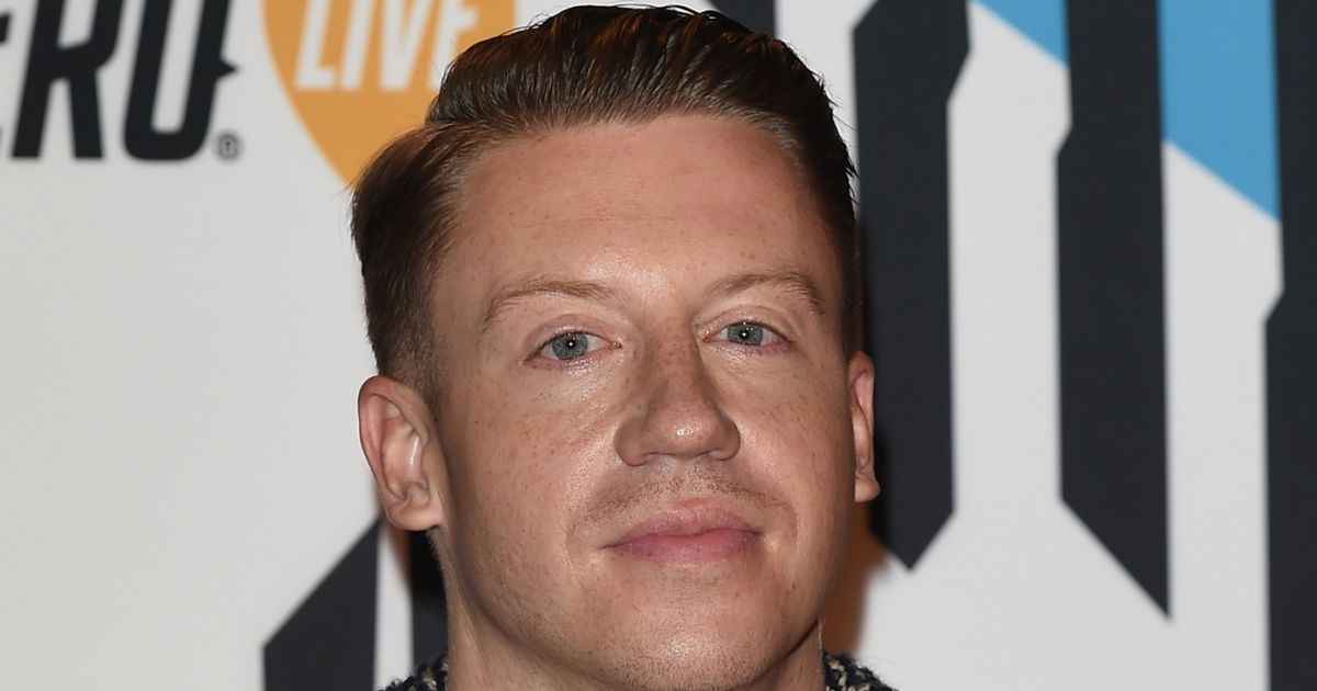 Macklemore looks unrecognisable as he shows off long curly hair and moustache