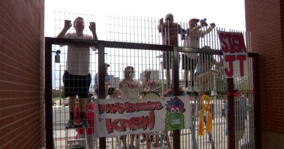 Baseball super fans go to extreme lengths to catch a glimpse of the game