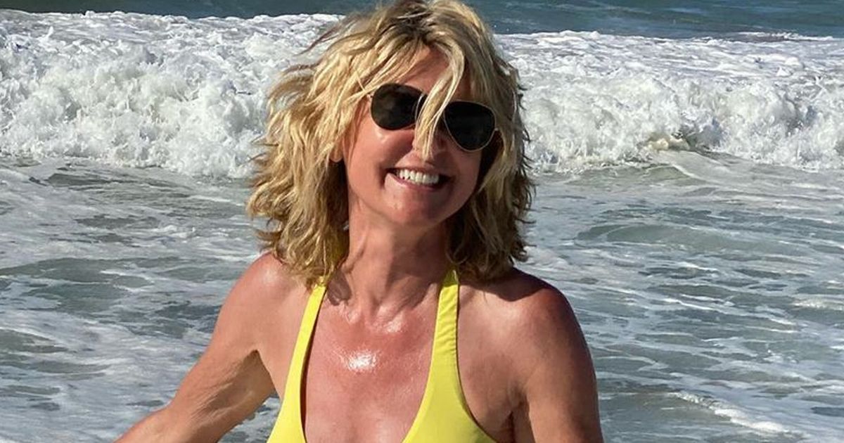 Anthea Turner, 60, looks sensational as she poses in tiny yellow bikini