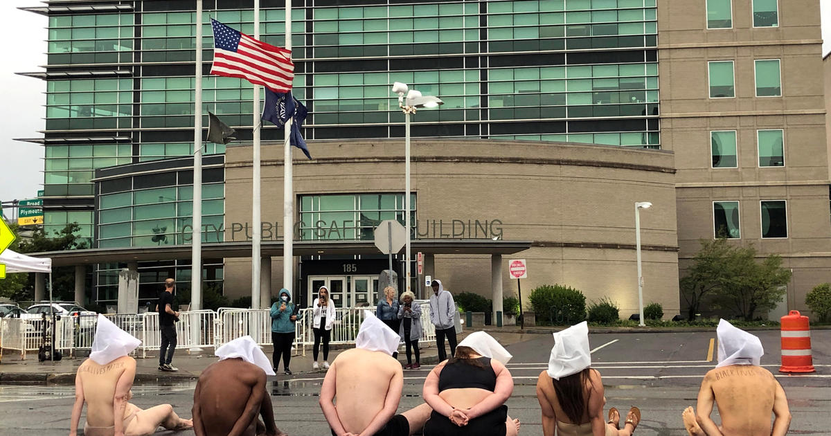 Nearly naked demonstrators protest Daniel Prude’s killing