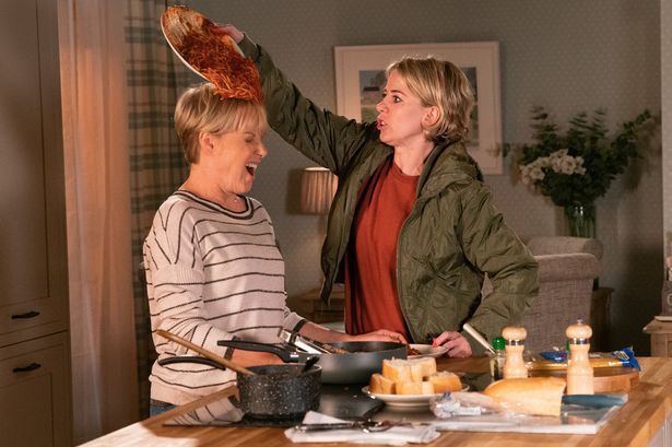 Abi tips spag bol over Sally Webster's head in Coronation Street