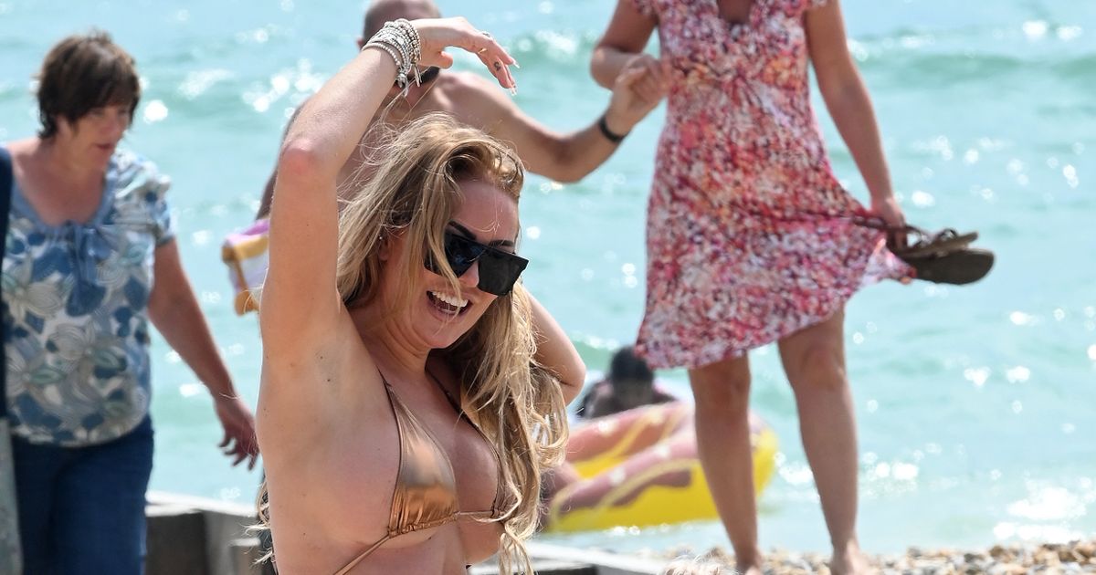 Aisleyne Horgan-Wallace’s pal gets intimate with sun cream on bizarre beach trip