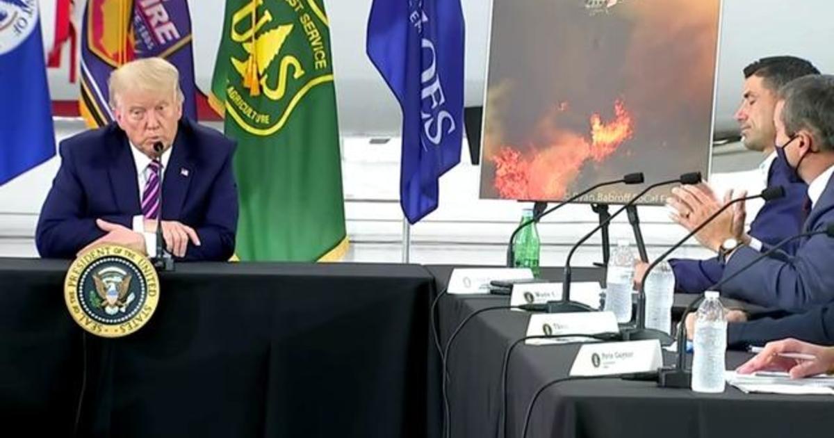 Trump disputes climate change at briefing on California wildfires