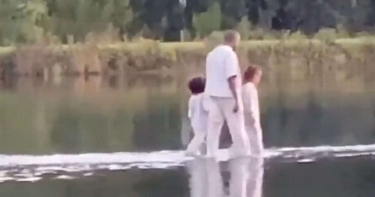 Kanye West walks on water as he takes children into spotlight at Sunday Service