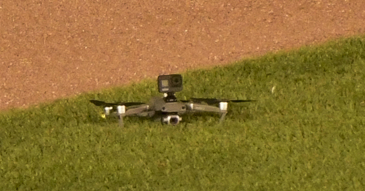 Drone lands in Wrigley Field outfield during game