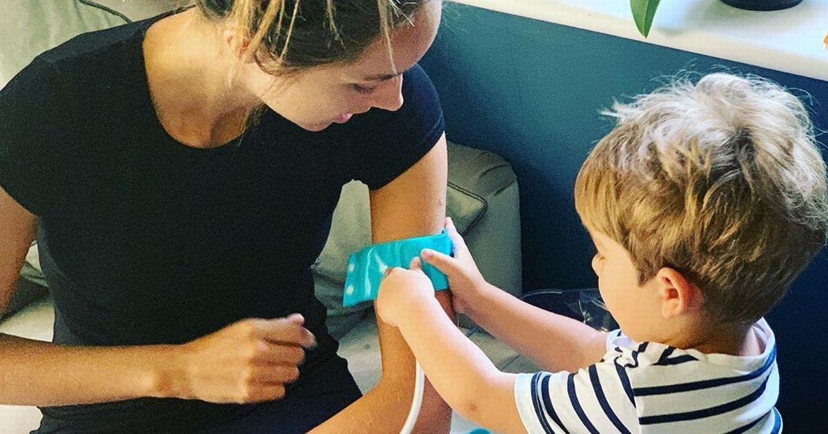 Peter Andre’s wife Emily rejects son’s cuddle as she’s in hospital uniform