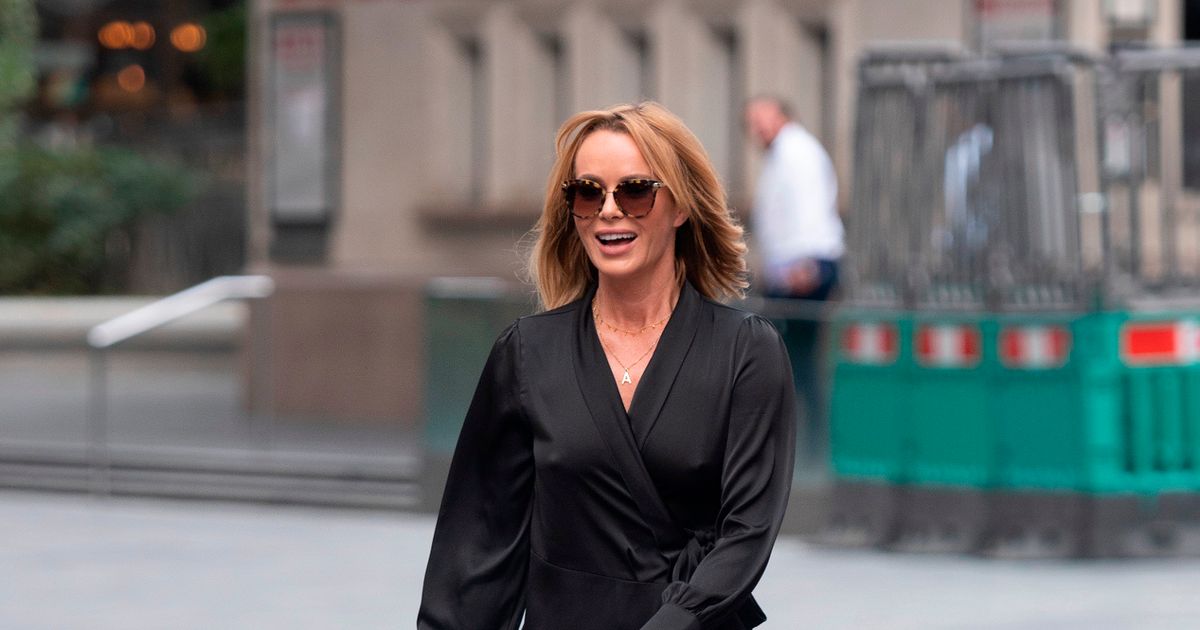 Amanda Holden unleashes endless bronzed legs in daring high-split frock