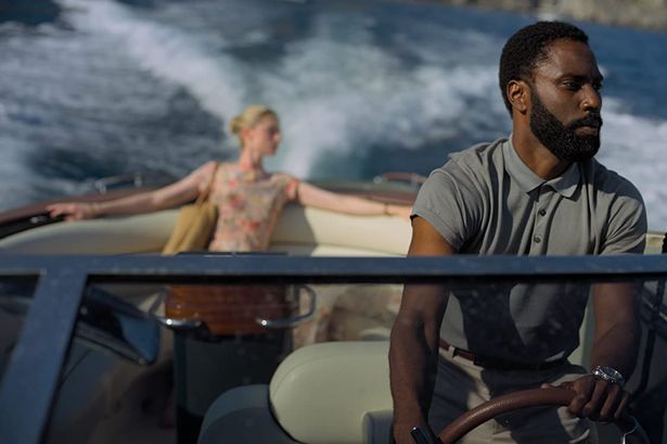 John David Washington and Elizabeth Debicki in Tenet