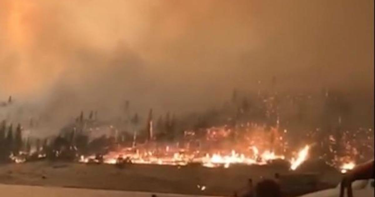 Helicopter rescues 200 trapped by fast-moving California wildfire