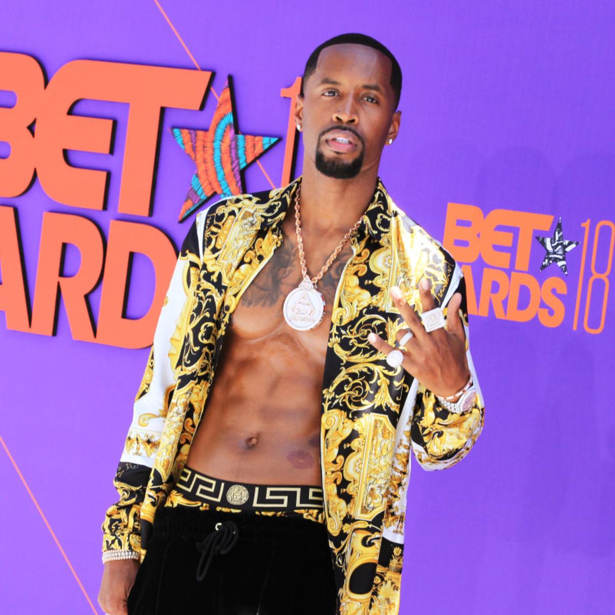 Safaree Poses With His And Erica Mena’s Baby Girl In His Arms – Check Out The Gorgeous Photo In Their Amazing Home