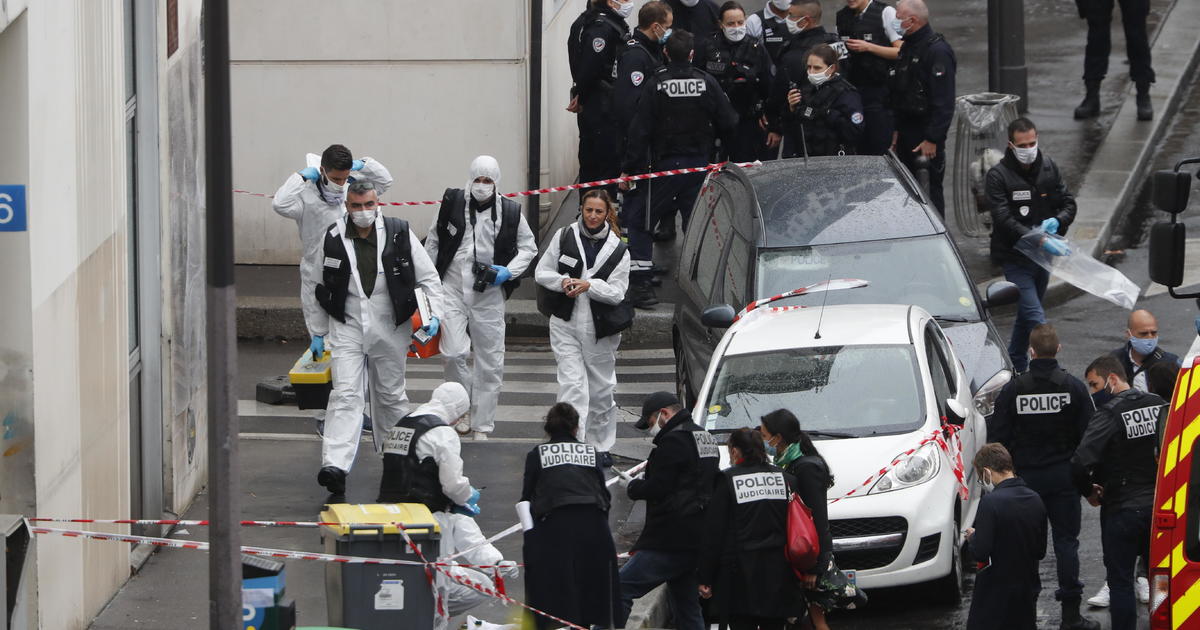 Suspect in Paris stabbings targeted Charlie Hebdo, official says