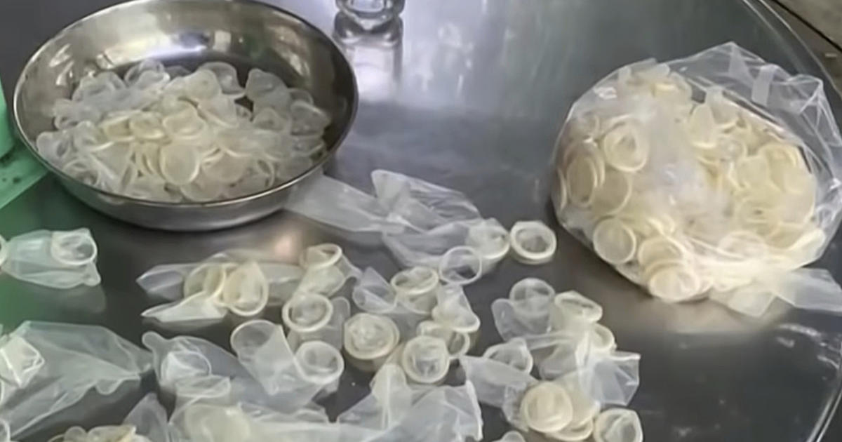 Police raid finds more than 300K used condoms being packed for resale