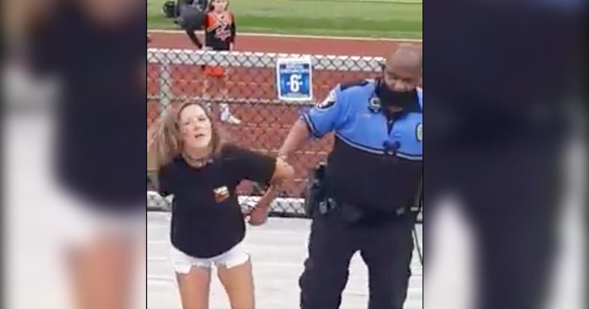 Woman tased after refusing to wear mask at football game